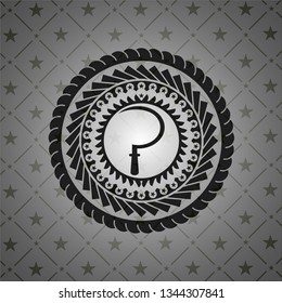 sickle icon inside dark emblem
