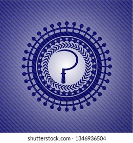 sickle icon inside emblem with denim high quality background