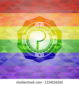 sickle icon inside emblem on mosaic background with the colors of the LGBT flag