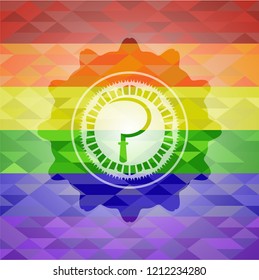 sickle icon inside emblem on mosaic background with the colors of the LGBT flag