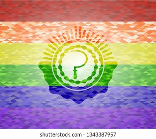 sickle icon inside emblem on mosaic background with the colors of the LGBT flag