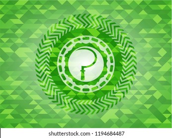 sickle icon inside green emblem with triangle mosaic background