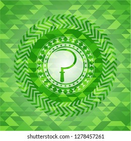 sickle icon inside green emblem. Mosaic background