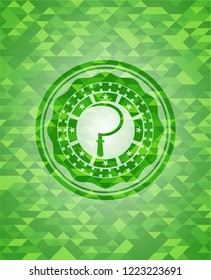 sickle icon inside green mosaic emblem