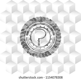 sickle icon inside grey badge with geometric cube white background