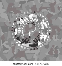 sickle icon inside grey camo emblem