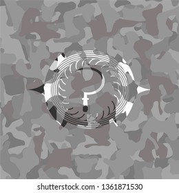 sickle icon inside grey camo emblem