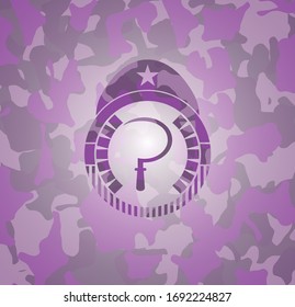 sickle icon inside pink and purple camo texture
