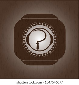 sickle icon inside retro style wooden emblem