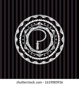sickle icon inside silvery badge