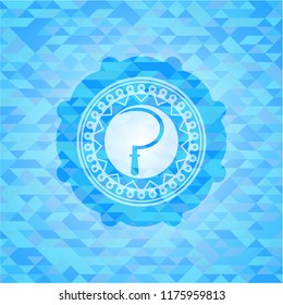 sickle icon inside sky blue emblem. Mosaic background