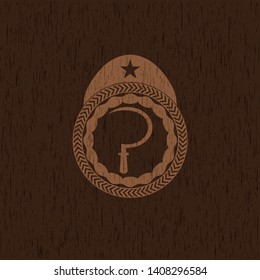 sickle icon inside vintage wood emblem
