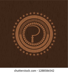sickle icon inside vintage wooden emblem