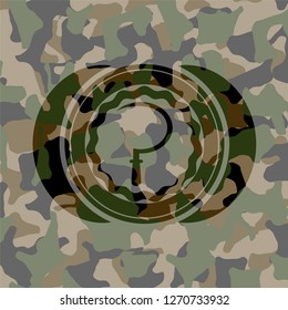 sickle icon on camo texture
