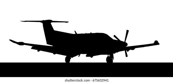 Side profile of a luxury Pilatus-PC12 single prop aircraft 