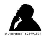Side profile portrait silhouette of a teenage boy thinking finger on lips