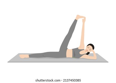 Side Reclining Leg Lift Pose, Vishnu Pose, Eternal One Pose. Beautiful girl practice Anantasana. Young attractive woman practicing yoga exercise. working out, black wearing sportswear, grey pants