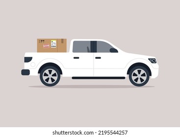 A side view of a big pick up truck loaded with a cardboard box, a cargo transportation concept