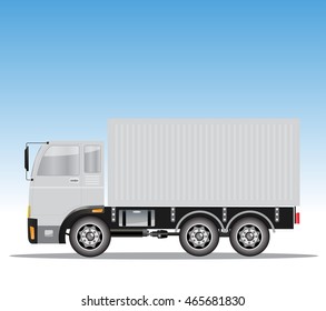 Side view of Cargo Container Truck with Blue sky background