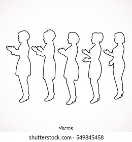 Side view of clapping women standing together against,  applause of the public after show. 