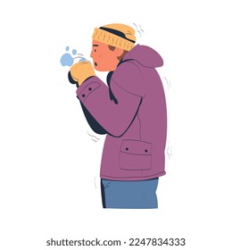 Side view of young man freezing wearing warm clothes. Man warming hands during winter or autumn season cartoon vector illustration