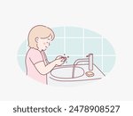 Side view of young preschool aged child washing hands with soap. Hand drawn style vector design illustrations.