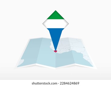Sierra Leone is depicted on a folded paper map and pinned location marker with flag of Sierra Leone. Folded vector map.
