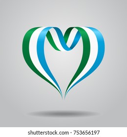 Sierra Leone flag heart-shaped wavy ribbon. Vector illustration.