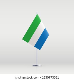 Sierra Leone flag state symbol isolated on background national banner. Greeting card National Independence Day of the Republic of Sierra Leone. Illustration banner with realistic state flag.