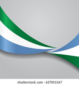 Sierra Leone flag wavy abstract background. Vector illustration.