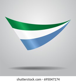 Sierra Leone flag wavy abstract background. Vector illustration.