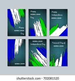 Sierra Leone Patriotic Cards for National Day. Expressive Brush Stroke in Flag Colors on dark striped background. Vector Greeting Card.