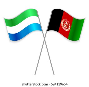 Sierra Leonean and Afghan crossed flags. Sierra Leone combined with Afghanistan isolated on white. Language learning, international business or travel concept.