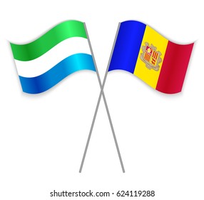 Sierra Leonean and Andorran crossed flags. Sierra Leone combined with Andorra isolated on white. Language learning, international business or travel concept.