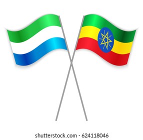 Sierra Leonean and Ethiopian crossed flags. Sierra Leone combined with Ethiopia isolated on white. Language learning, international business or travel concept.