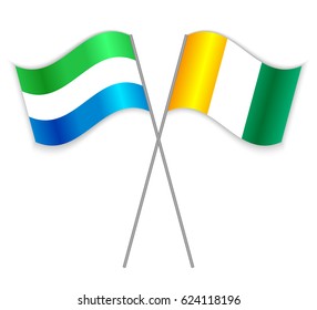 Sierra Leonean and Ivorian crossed flags. Sierra Leone combined with Ivory Coast isolated on white. Language learning, international business or travel concept.