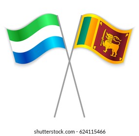 Sierra Leonean and Sri Lankan crossed flags. Sierra Leone combined with Sri Lanka isolated on white. Language learning, international business or travel concept.