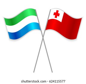 Sierra Leonean and Tongan crossed flags. Sierra Leone combined with Tonga isolated on white. Language learning, international business or travel concept.