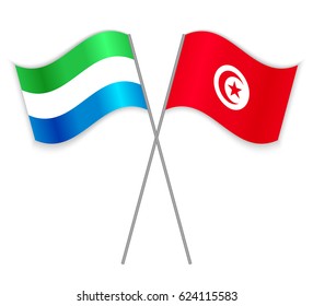 Sierra Leonean and Tunisian crossed flags. Sierra Leone combined with Tunisia isolated on white. Language learning, international business or travel concept.