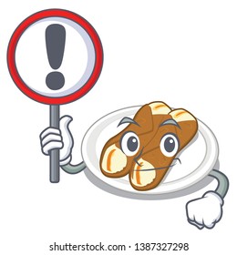 With sign cannoli is served on mascot plate