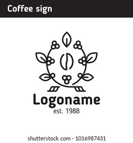 Sign for the coffee house, coffee beans in the frame of coffee berries