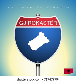 An Sign Road America Style with state of Albania with Green background and message, Gjirokaster and map, vector art image illustration