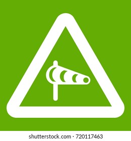 Sign warning about cross wind from the left icon white isolated on green background. Vector illustration