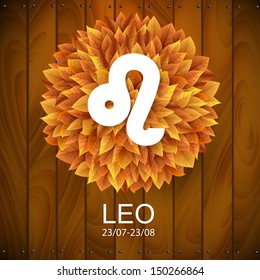 Sign of the zodiac. Leo horoscope. white sign with a circle of autumn leaves. Wooden planks background