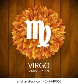 Sign of the zodiac. Virgo horoscope. white sign with a circle of autumn leaves. Wooden planks background