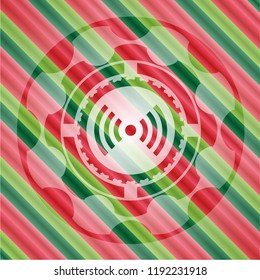 signal icon inside christmas colors badge.