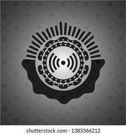 signal icon inside dark badge or emblem
