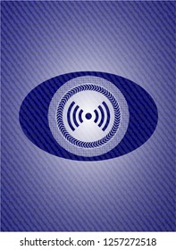 signal icon inside denim background