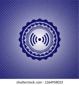 signal icon inside denim background