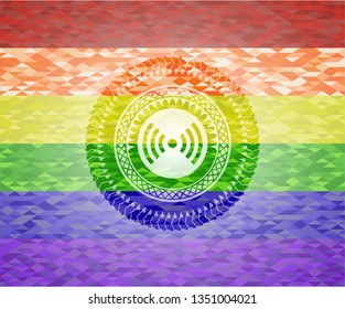 signal icon inside emblem on mosaic background with the colors of the LGBT flag